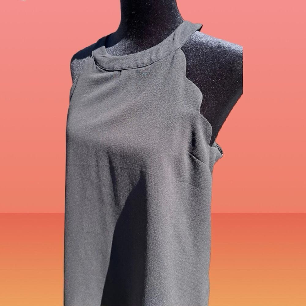 Monteau Halter neck, black top with scalloped arms, women's size M, sleeveless